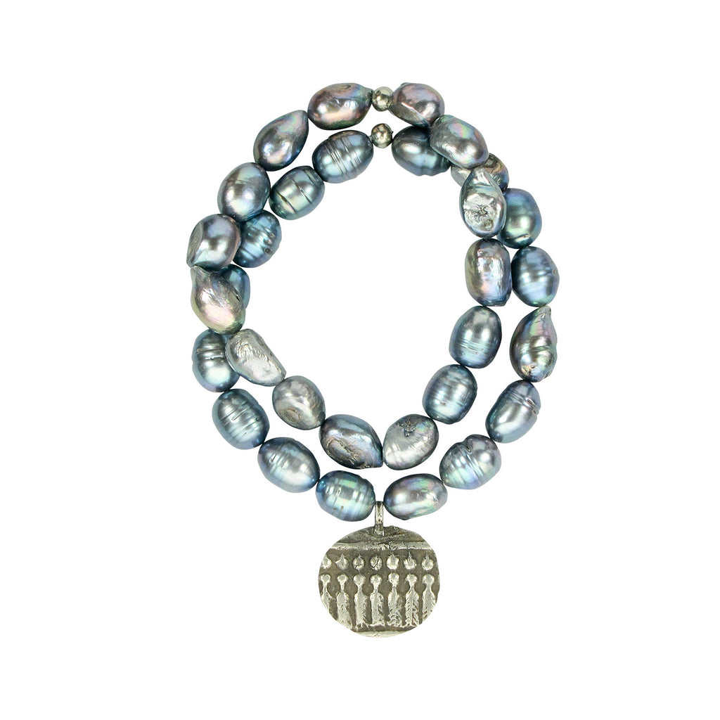 Pearl and Seven Sisters Amulet